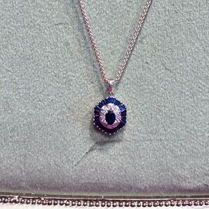 Elegant silver and gold sapphire and diamond rest